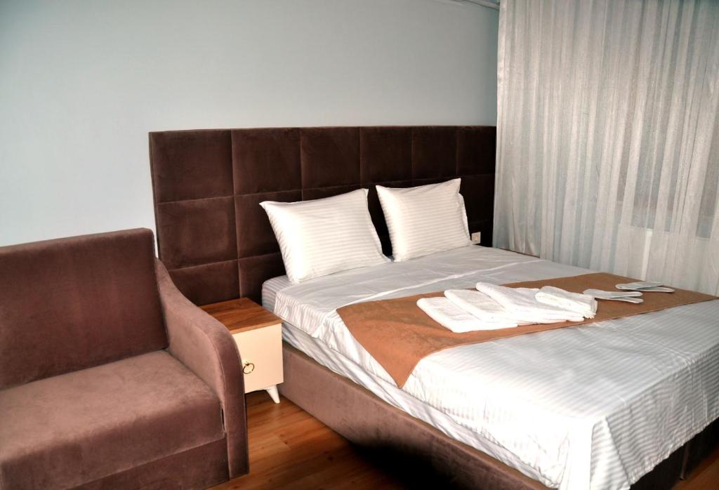A bed or beds in a room at Terra Apart Taksim