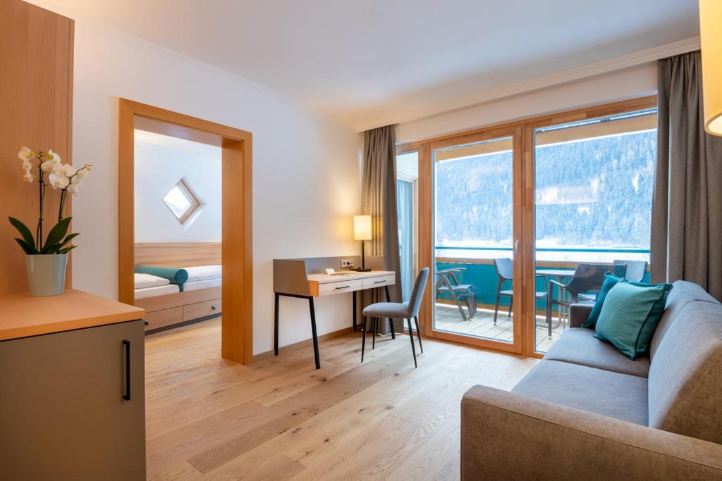 A seating area at Familien- Sportresort BRENNSEEHOF