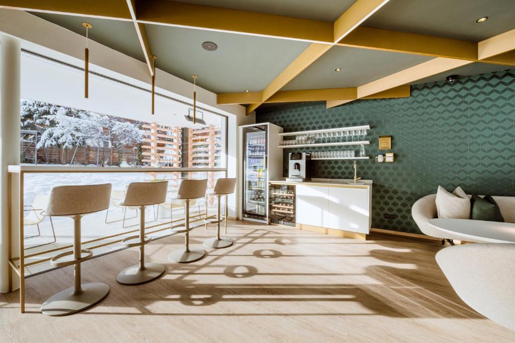 A kitchen or kitchenette at Crystls Aparthotel