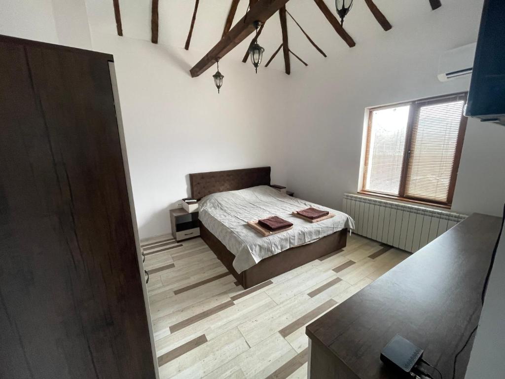 Postel nebo postele na pokoji v ubytování DeTY’s Guest House