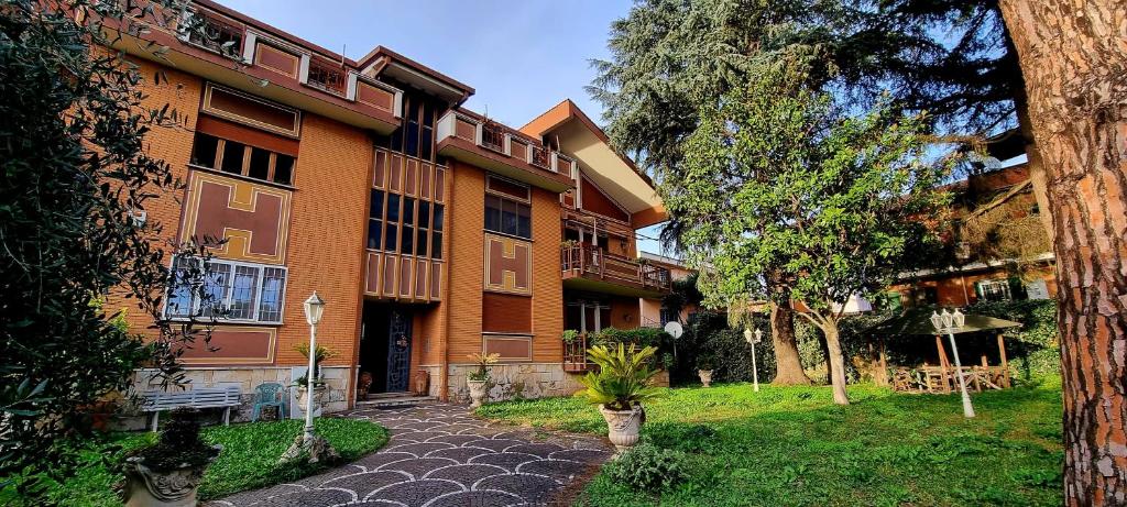 a building with a pathway in front of it at TSUKI House in Marino