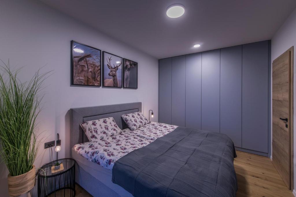 Postel nebo postele na pokoji v ubytování Apartmaji Harpf