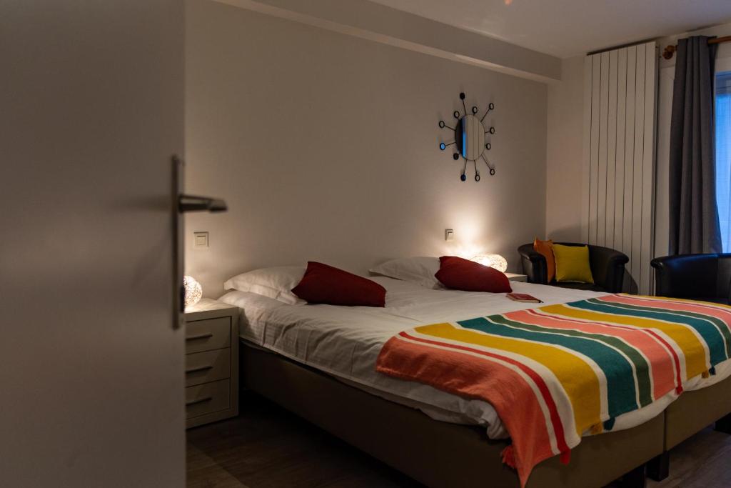 Postel nebo postele na pokoji v ubytování Hotel Les Mouettes