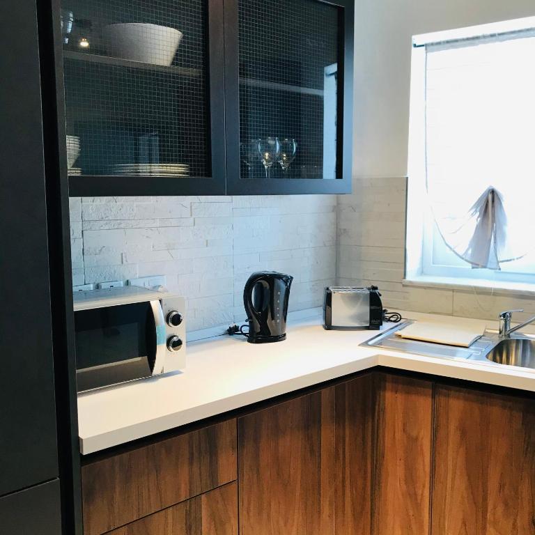 Kuchyň nebo kuchyňský kout v ubytování Zenith Apartment A20