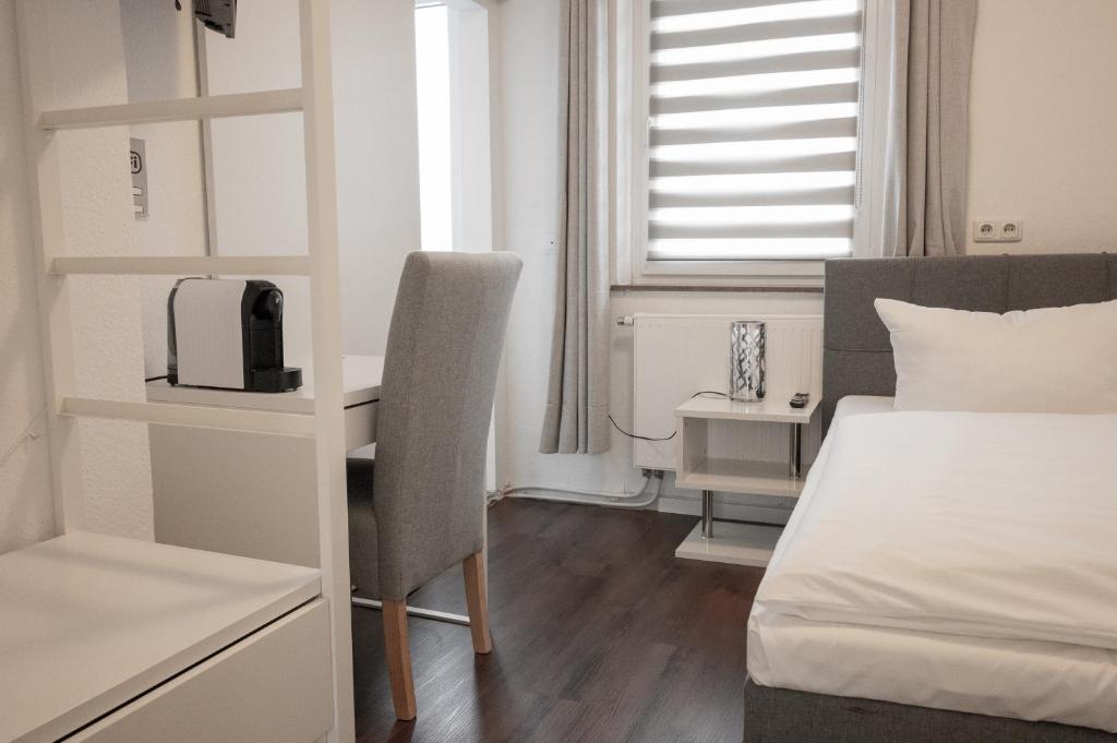 Postel nebo postele na pokoji v ubytování Hotel Teatro