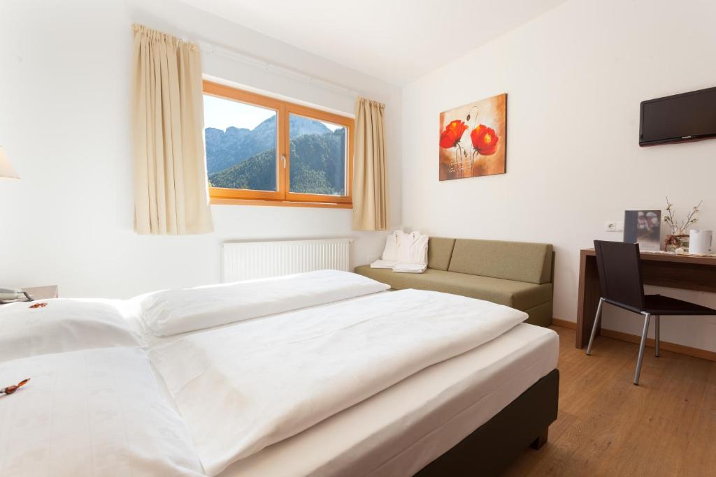 Postel nebo postele na pokoji v ubytování Hotel Sole - Sonne