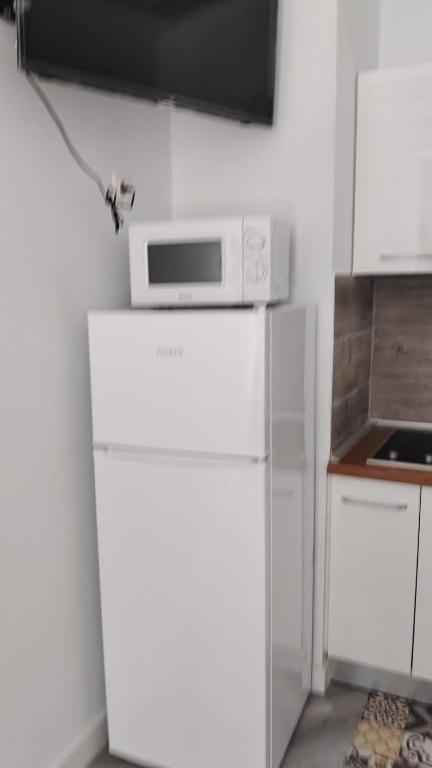 A kitchen or kitchenette at Lodge El Muelle Arinaga
