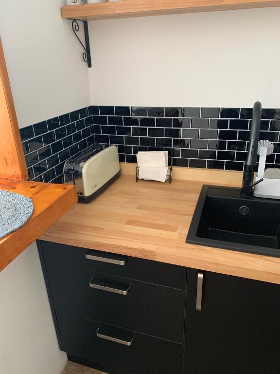 Kuchyň nebo kuchyňský kout v ubytování acogedor apartamento 2 dormitorios