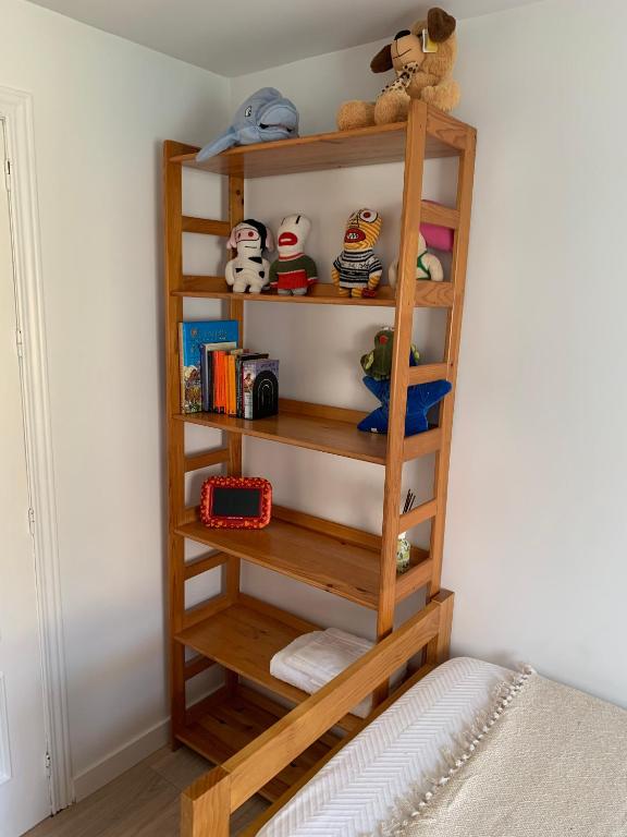 Palanda nebo palandy na pokoji v ubytování acogedor apartamento 2 dormitorios