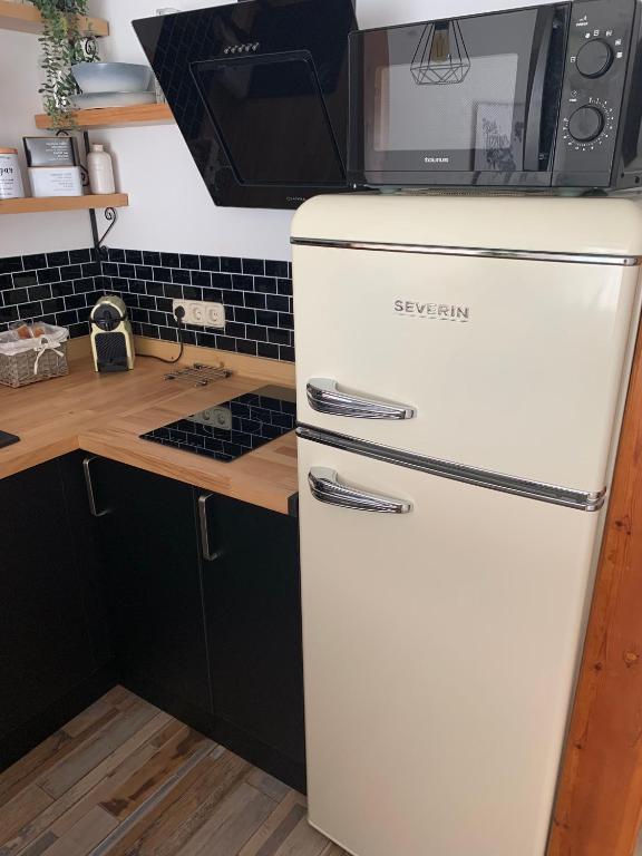 Kuchyň nebo kuchyňský kout v ubytování acogedor apartamento 2 dormitorios