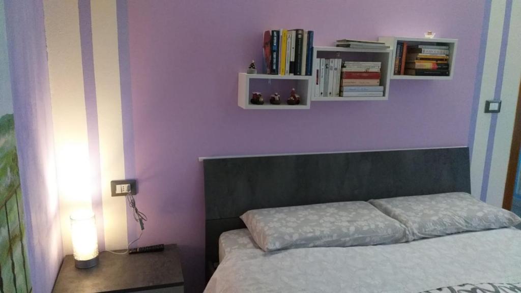 Katil atau katil-katil dalam bilik di B&B Il Glicine Nascosto