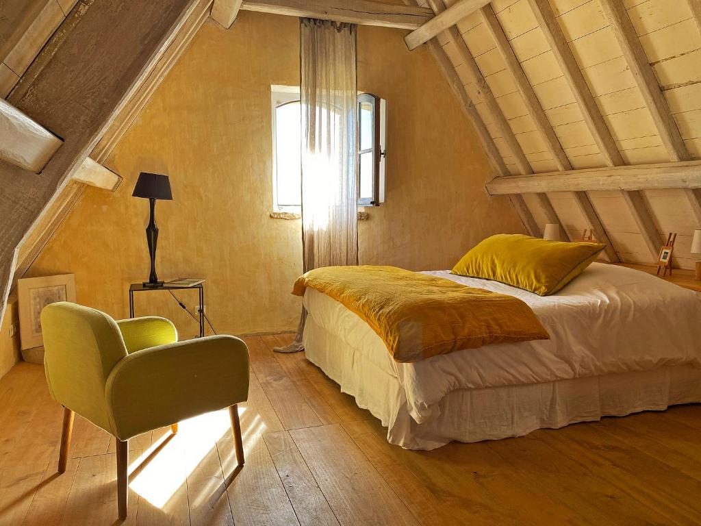 Postel nebo postele na pokoji v ubytování Eco-hameau Du Sentier Des Sources