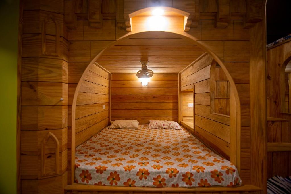 Postel nebo postele na pokoji v ubytování Godwill Casa Varca