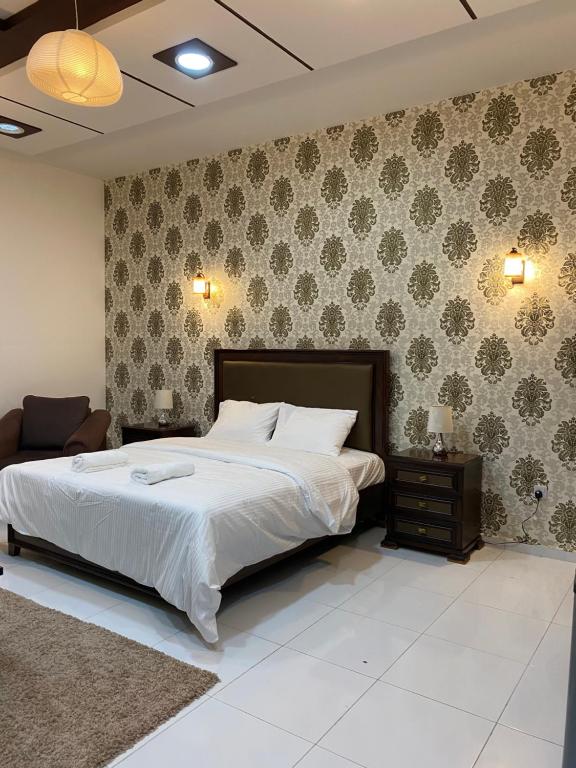Postel nebo postele na pokoji v ubytování Aryaf hostel