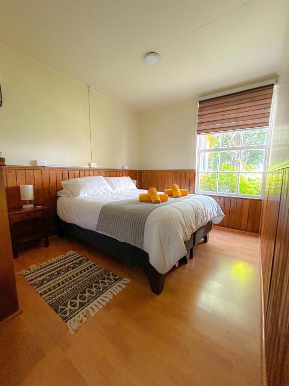 Voodi või voodid majutusasutuse Riverline lodge toas