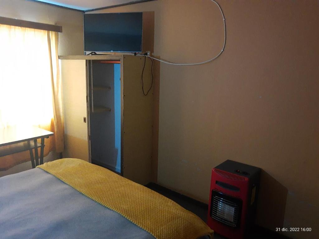 Postel nebo postele na pokoji v ubytování Hostal Klein