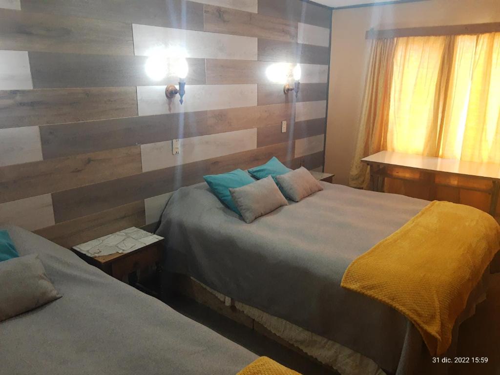 Postel nebo postele na pokoji v ubytování Hostal Klein