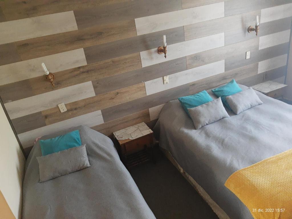 Postel nebo postele na pokoji v ubytování Hostal Klein