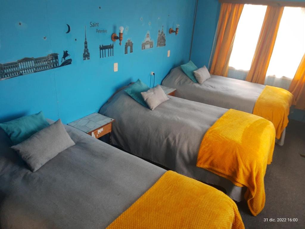 Postel nebo postele na pokoji v ubytování Hostal Klein