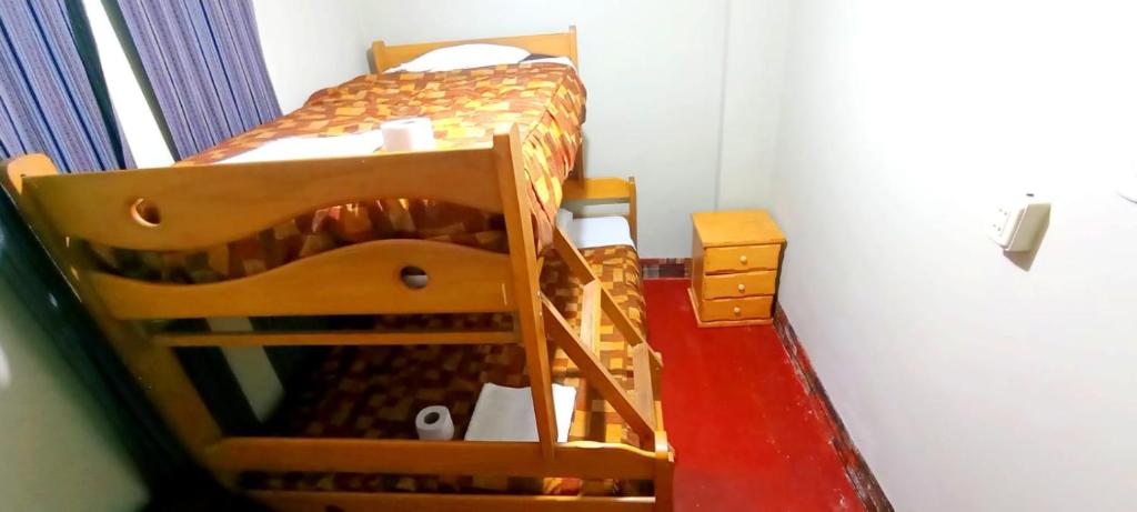 Un ou plusieurs lits dans un hébergement de l'établissement Andes Hostel