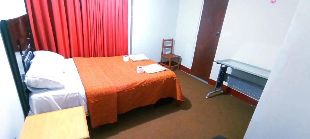 Un ou plusieurs lits dans un hébergement de l'établissement Andes Hostel