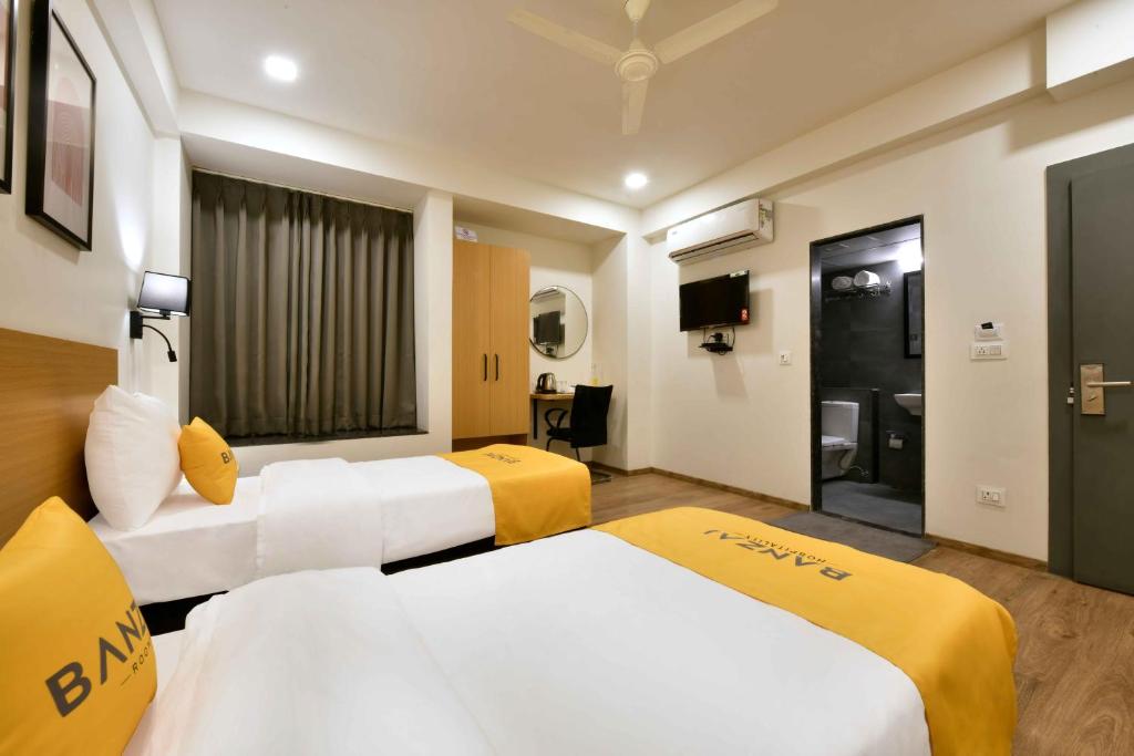 Postel nebo postele na pokoji v ubytování BANZAI ROOMS