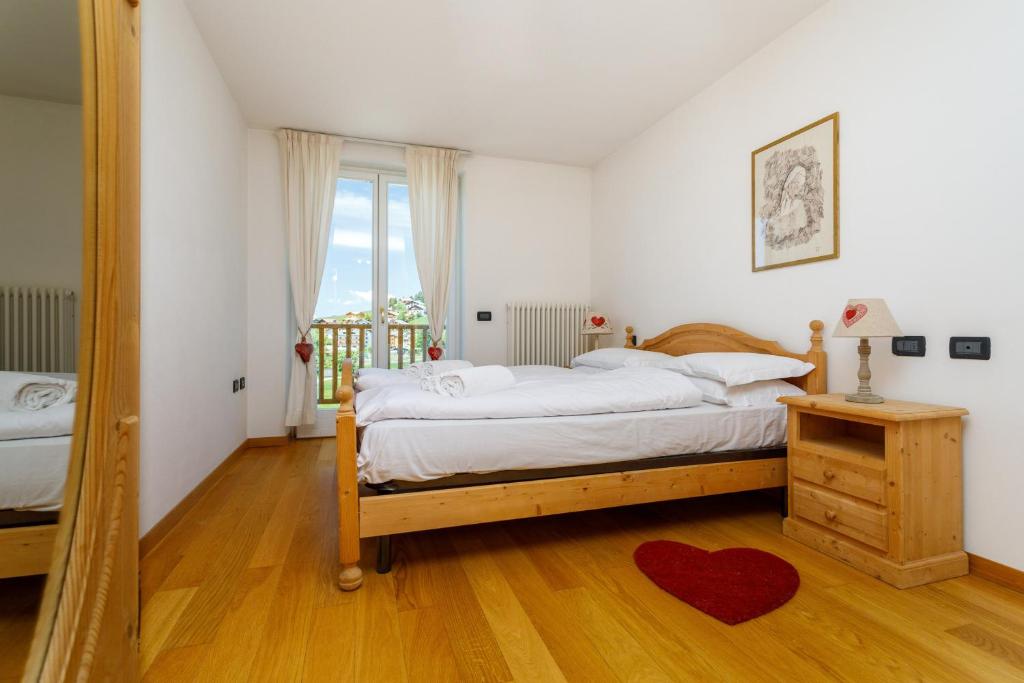 Postel nebo postele na pokoji v ubytování Residence Stella
