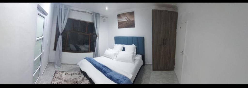 Postel nebo postele na pokoji v ubytování Blue Nile Guest