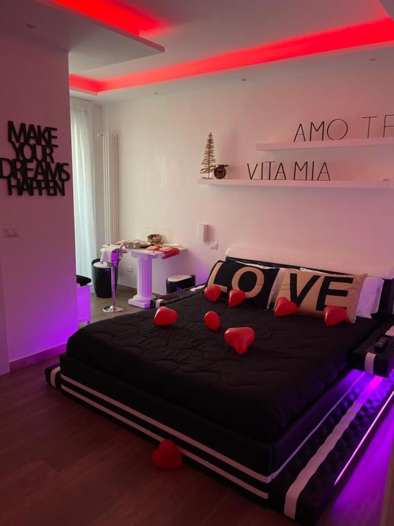 Posteľ alebo postele v izbe v ubytovaní Due Cuori Suite