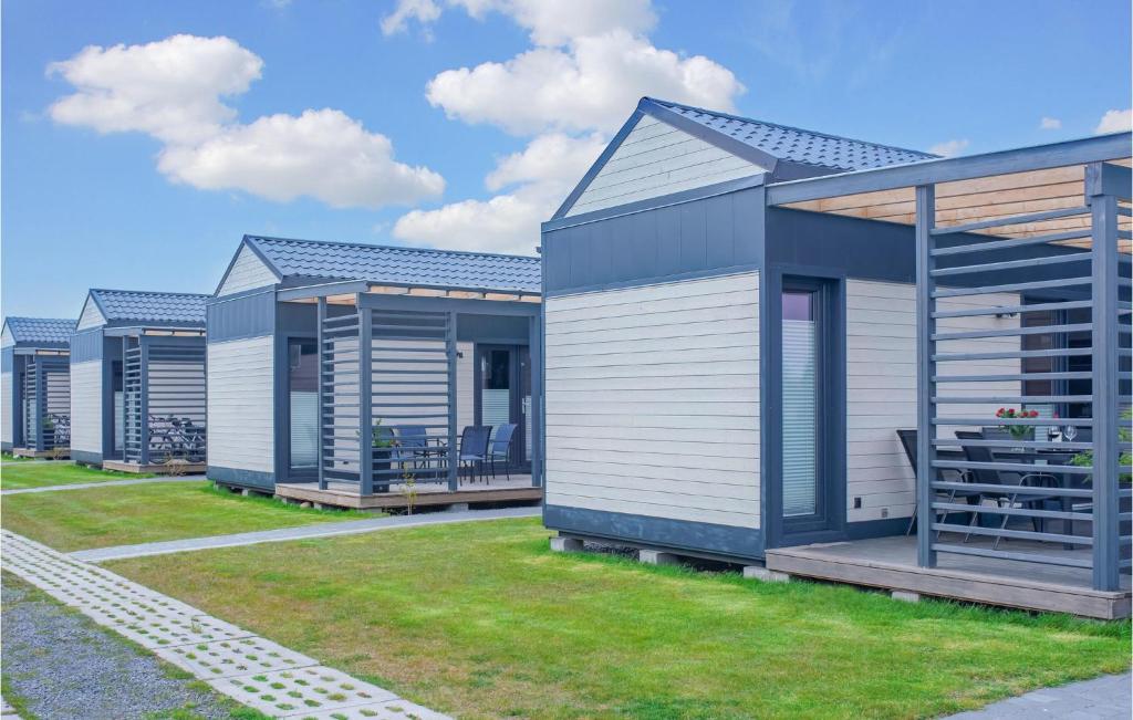 a row of modular homes in a row at Beautiful Home In Jezierzany With Sauna in Jezierzany