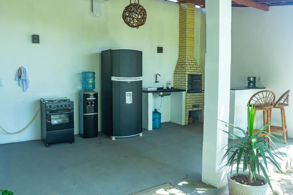 Kuchyň nebo kuchyňský kout v ubytování Barra Beach House