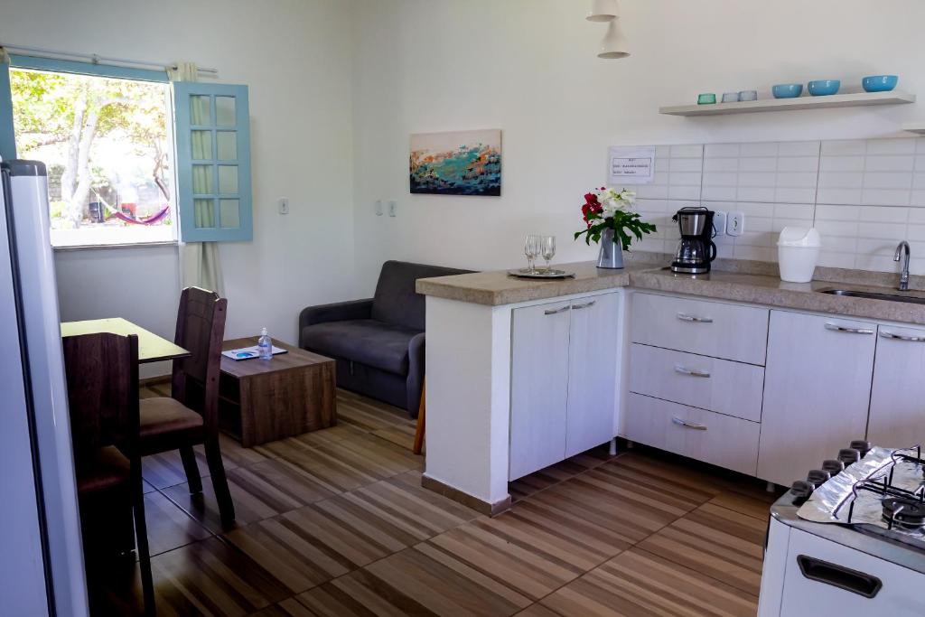 Kuchyň nebo kuchyňský kout v ubytování Barra Beach House