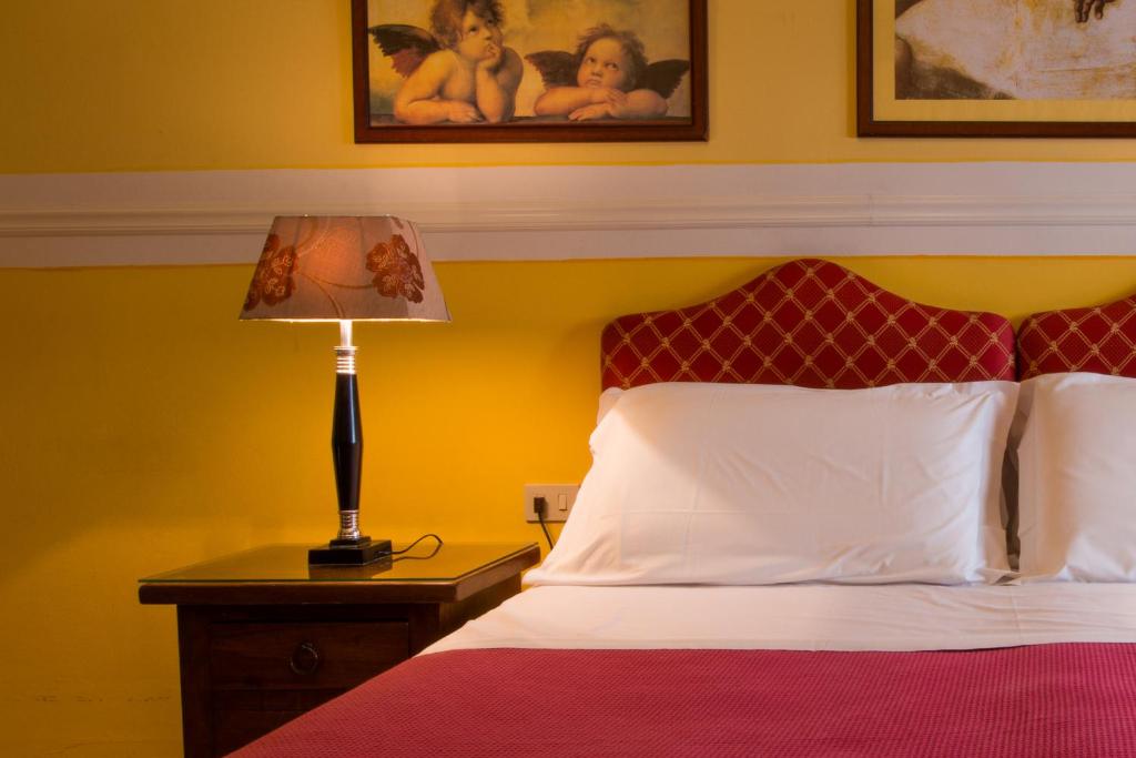 Posteľ alebo postele v izbe v ubytovaní B&B Old Florence Inn