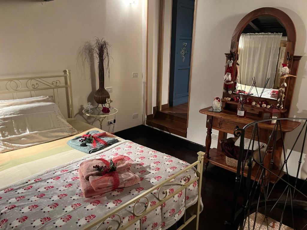 Postel nebo postele na pokoji v ubytování IL PICCOLO PARADISO