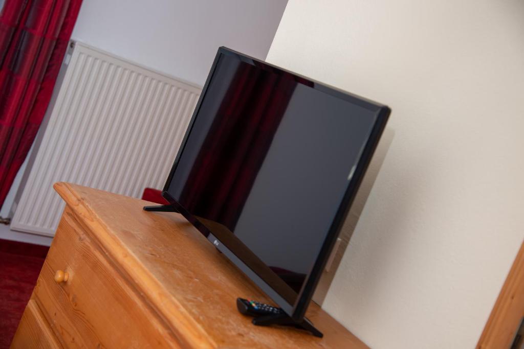 Televízia a/alebo spoločenská miestnosť v ubytovaní Ferienwohnung Seifterhof