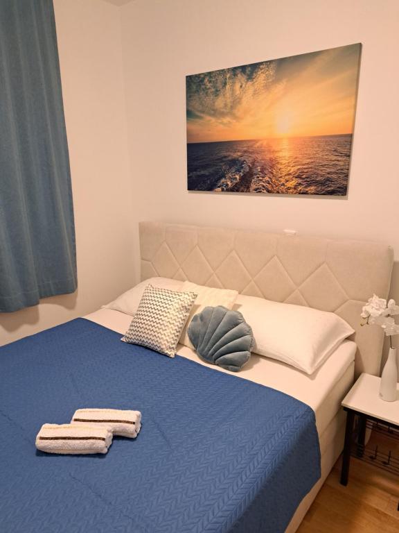 Posteľ alebo postele v izbe v ubytovaní Apartman Blue