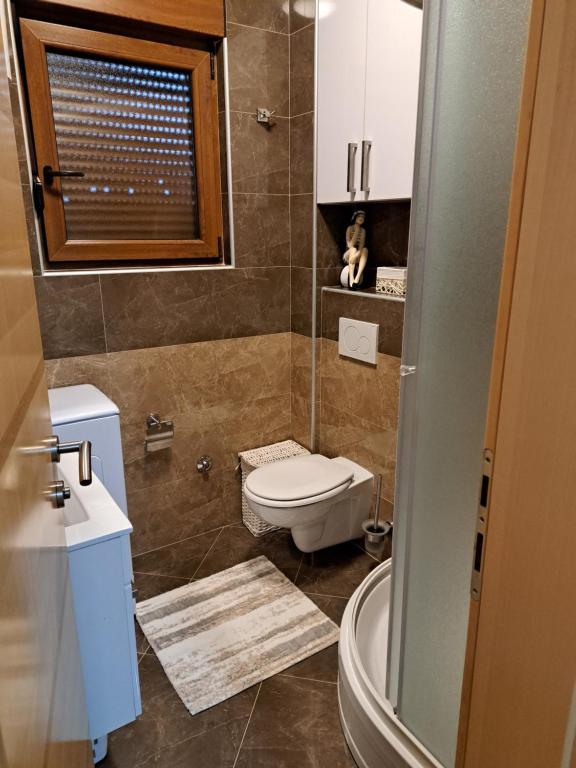 Kúpeľňa v ubytovaní Apartman Blue