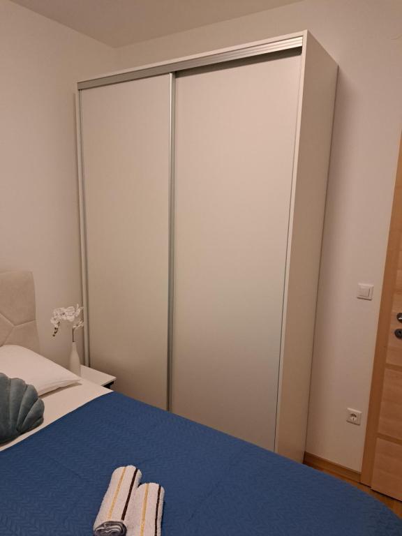 Posteľ alebo postele v izbe v ubytovaní Apartman Blue