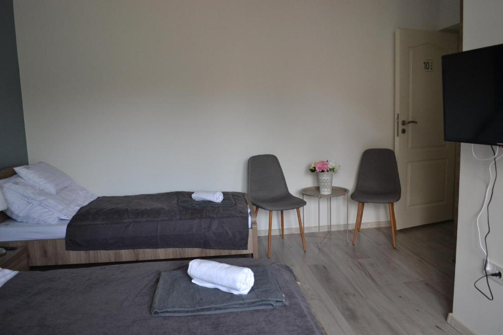 TV a/nebo společenská místnost v ubytování Főnix Design Rooms