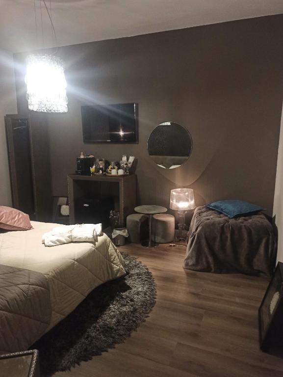 Postel nebo postele na pokoji v ubytování CHEZMOI (da me)