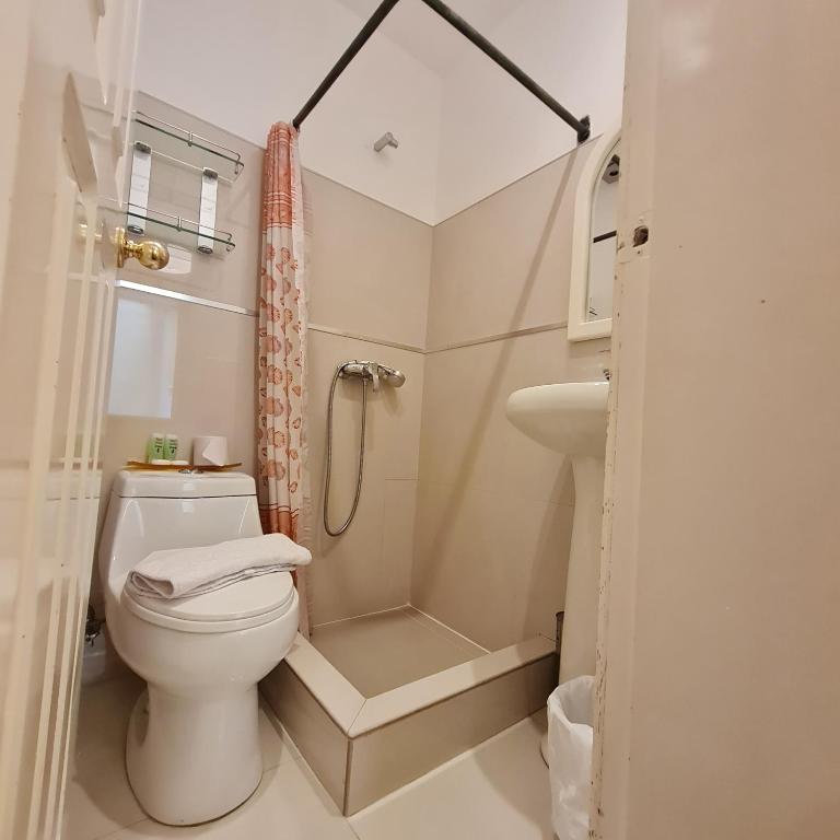 Koupelna v ubytování Hotel Cayman