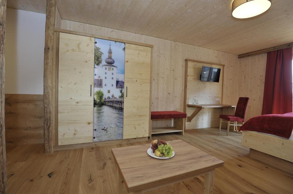 Een TV en/of entertainmentcenter bij Das Dorfhotel Engl-Grafinger
