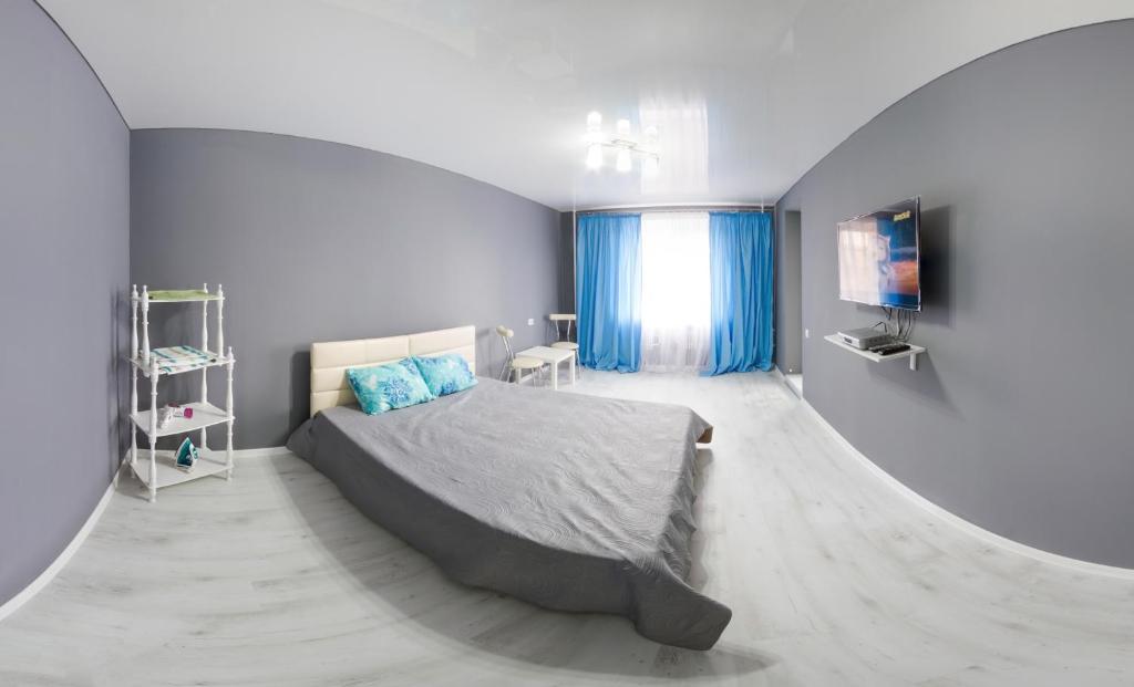 Cama o camas de una habitación en Kultury Street Apartment