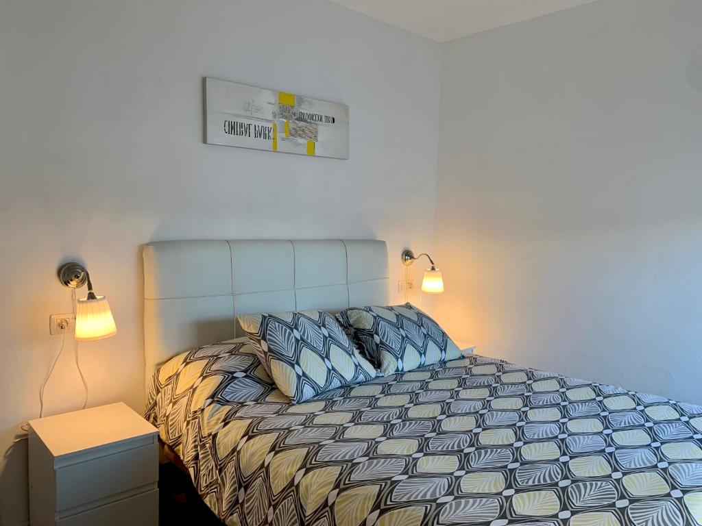 Postel nebo postele na pokoji v ubytování Apartamentos LlAMAR