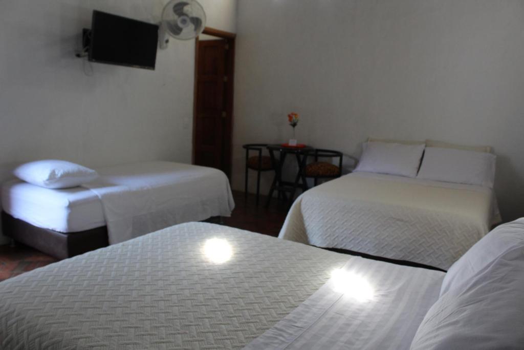 Postel nebo postele na pokoji v ubytování Casa Turistica Barichara