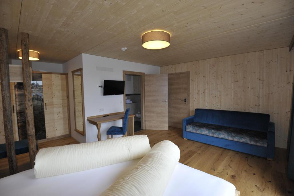 Een TV en/of entertainmentcenter bij Das Dorfhotel Engl-Grafinger
