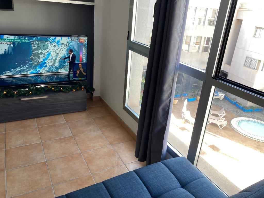 TV a/nebo společenská místnost v ubytování MARTSARAs PISCINA SARDINA