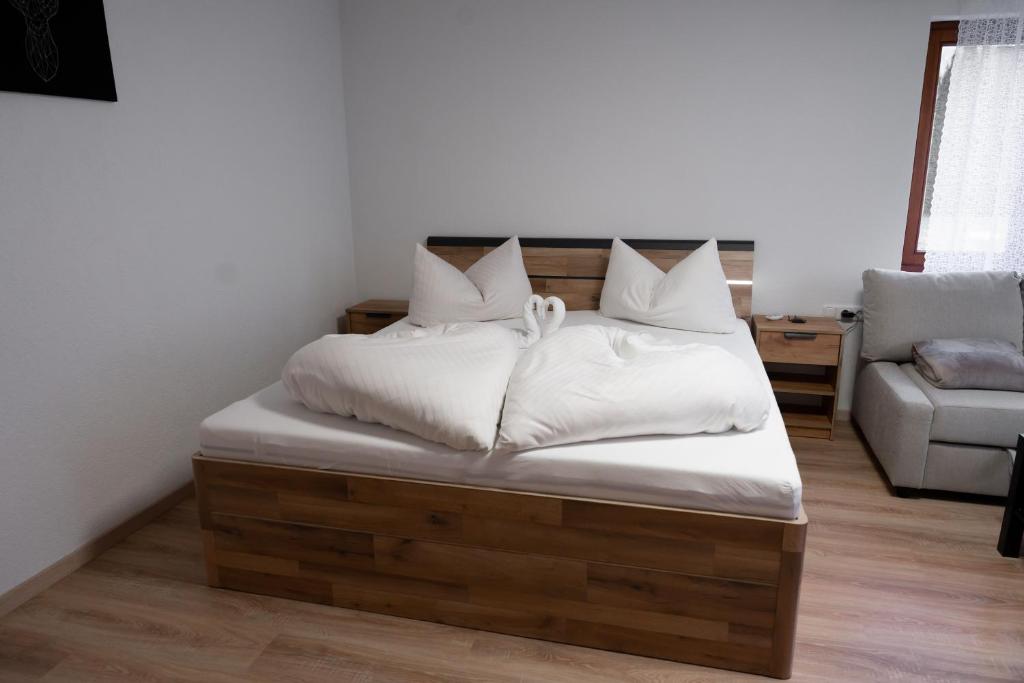 Postel nebo postele na pokoji v ubytování RIMA Apart‘s