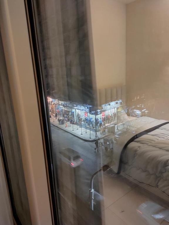 Postel nebo postele na pokoji v ubytování METROPOLITANO
