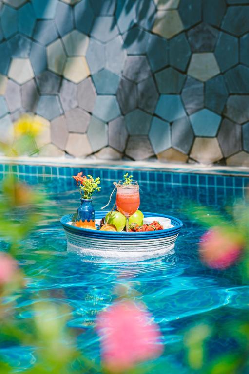 Bazén v ubytování De'Colore Villa Hoi An nebo v jeho okolí